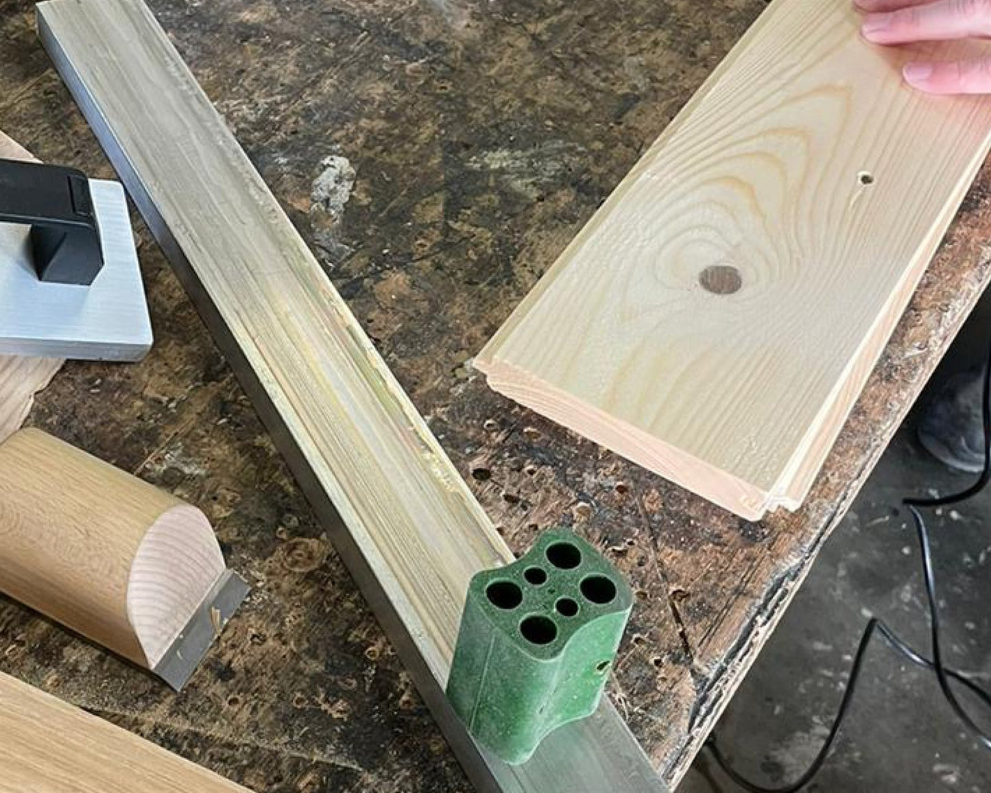 Knot Filler repairing a knot in pine wood