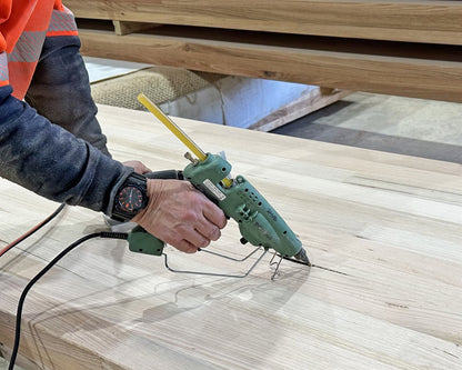 Knot Filler used in glulam and CLT production for industrial wood repair