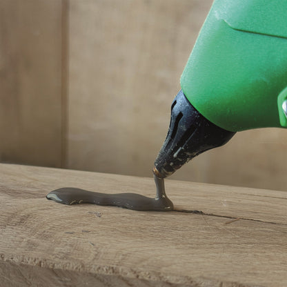 Close-up of Knot Filler being applied into a wood defect