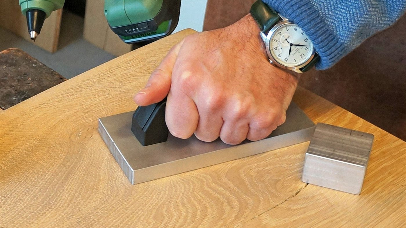 Wood Repair step 2, Cool: Press it flat with the cooling brick. It sets in seconds.